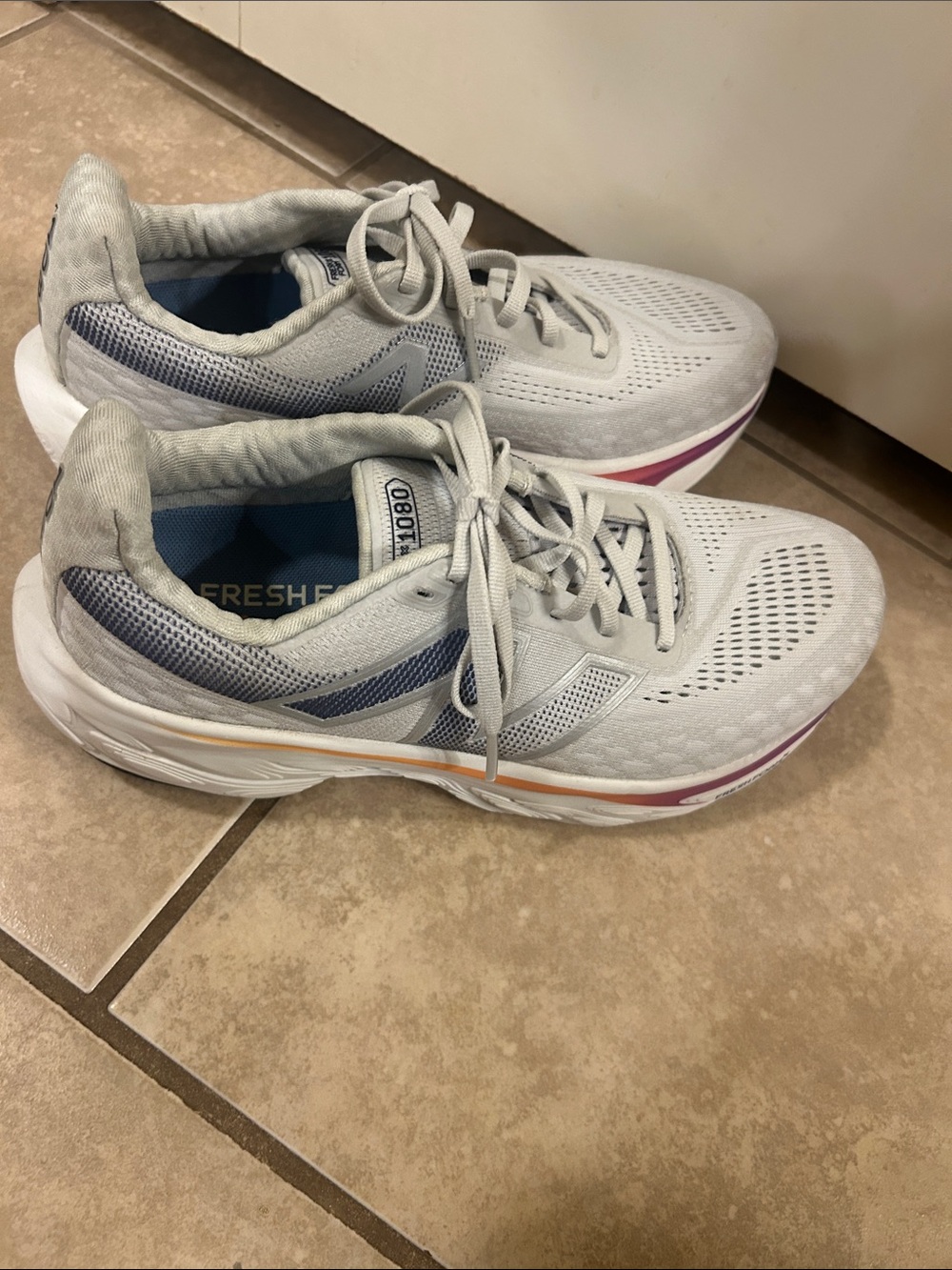 New Balance Women's Light Gray Running Shoes with purple and Pink Accents